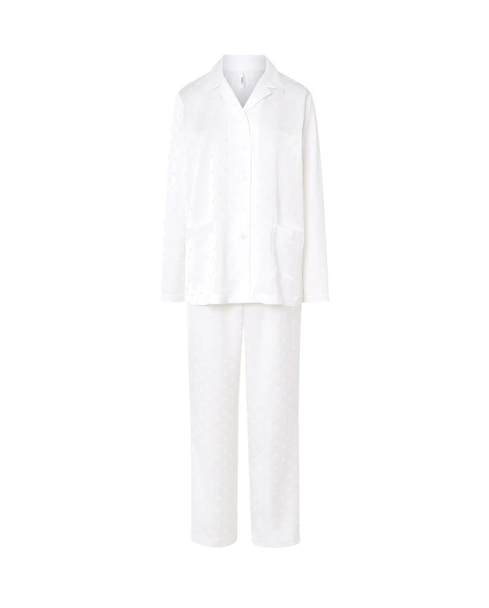 Pijama largo de mujer de manga larga estilo camisero abierto con solapa y botones color marfil con estampado de topos en raso.