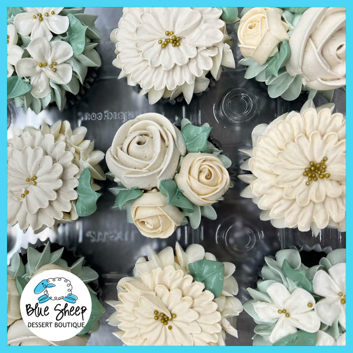 Floral tea party themed cupcakes decorated with  buttercream flowers – perfect for bridal showers and baby showers at Blue Sheep Bake Shop Somerville NJ