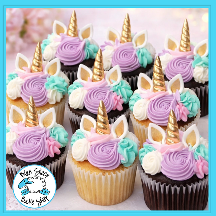 Teal and lavender custom unicorn cupcakes from Blue Sheep Bake Shop in Somerville NJ for birthdays and themed parties