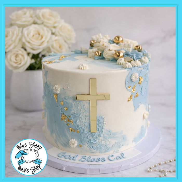 Blue and gold confirmation cake with cross and buttercream rosettes from Blue Sheep Bake Shop in Somerville NJ