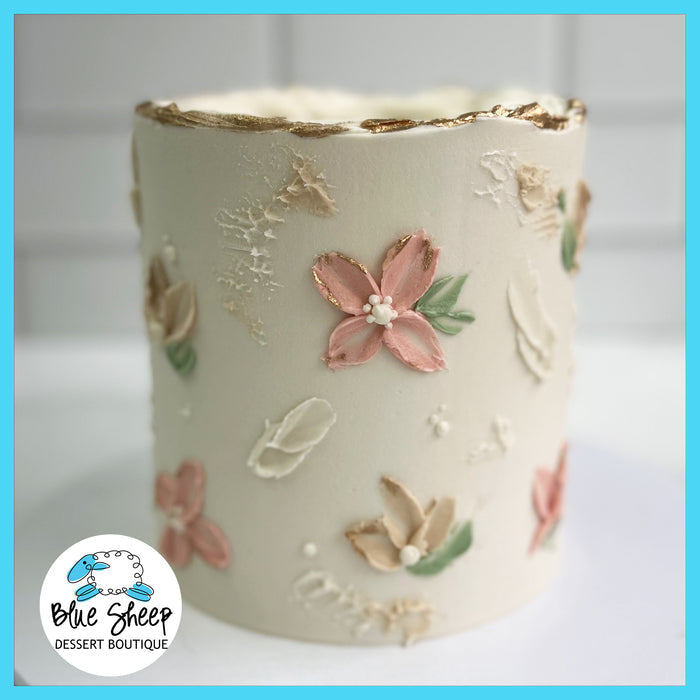 blushing wildflowers cake