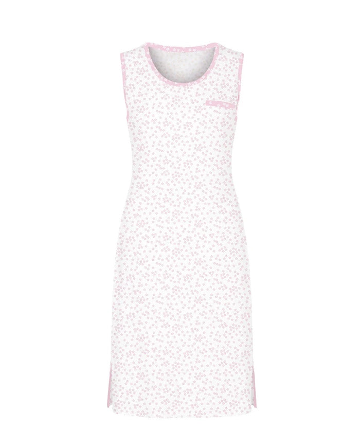 Camisón corto de mujer sin mangas tejido de punto blanco con estampado de florecitas rosas y escote redondo con contraste y bolsillo decorativo.