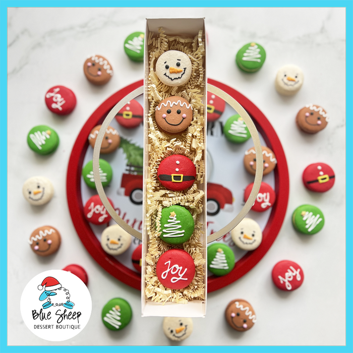 Christmas French Macaron Gift Set with snowman, gingerbread, Santa belt, JOY, and Christmas tree designs from Blue Sheep Bake Shop in Somerville NJ