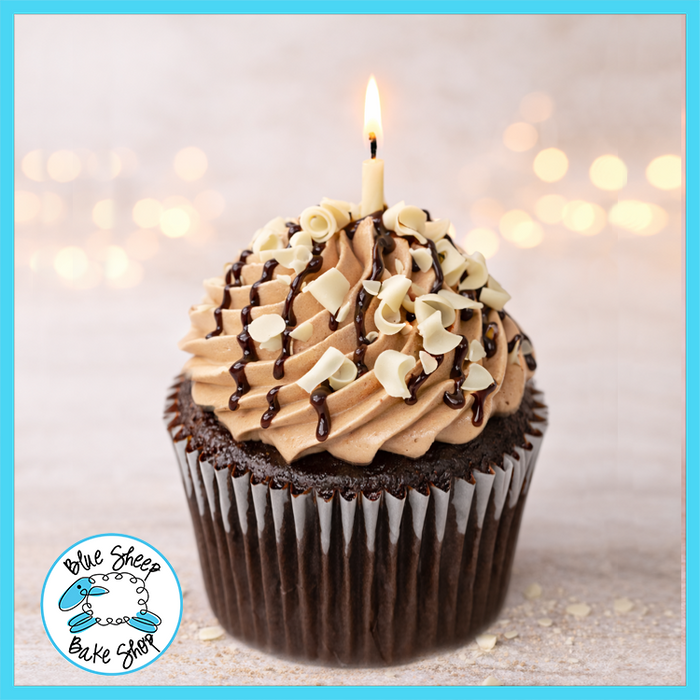 Death by chocolate cupcake with chocolate ganache, chocolate Swiss buttercream, and chocolate curls from Blue Sheep Bake Shop in Somerville NJ
