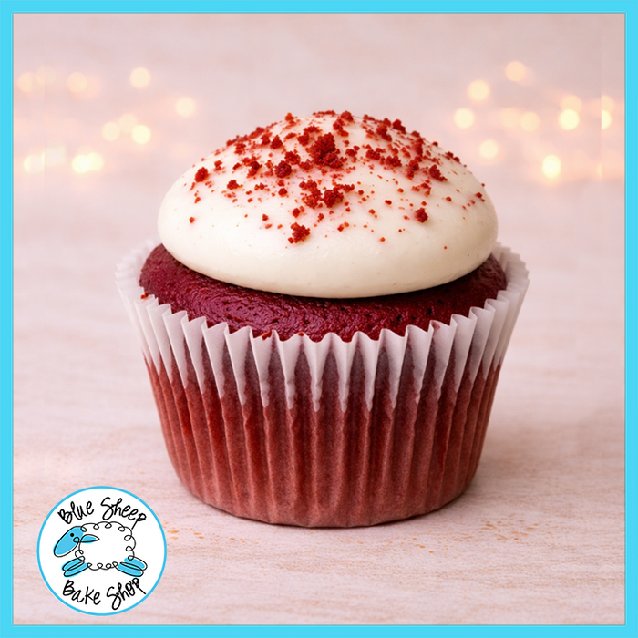 Classic red velvet cupcake with cream cheese frosting and red velvet cake crumbles from Blue Sheep Bake Shop in Somerville NJ