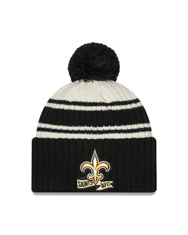 New Orleans Saints New Era 2022 Sideline - Sport Cuffed Pom Knit Hat - Cream/Black