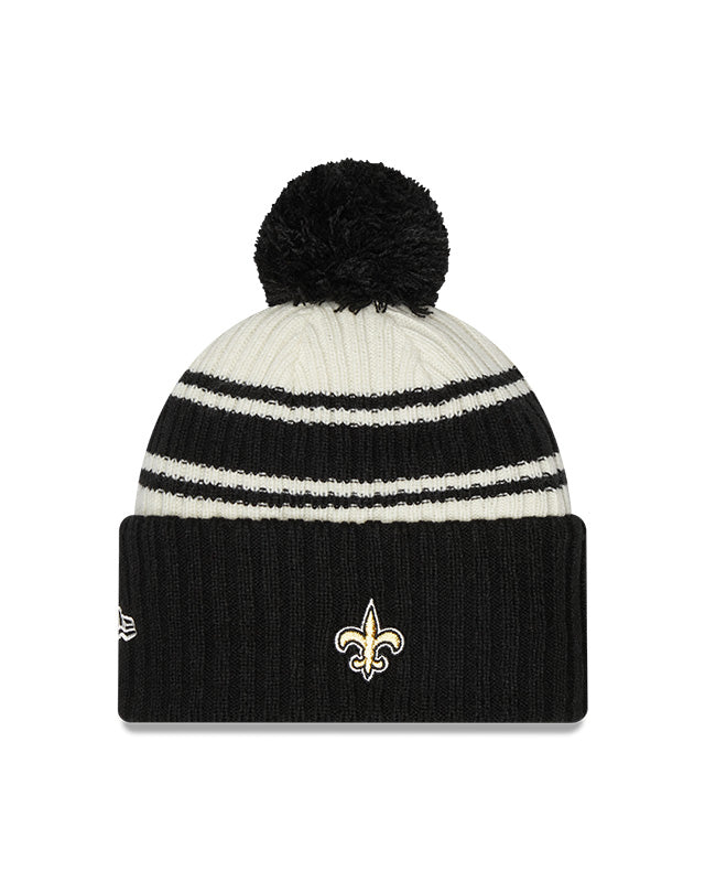 New Orleans Saints New Era 2022 Sideline - Sport Cuffed Pom Knit Hat - Cream/Black