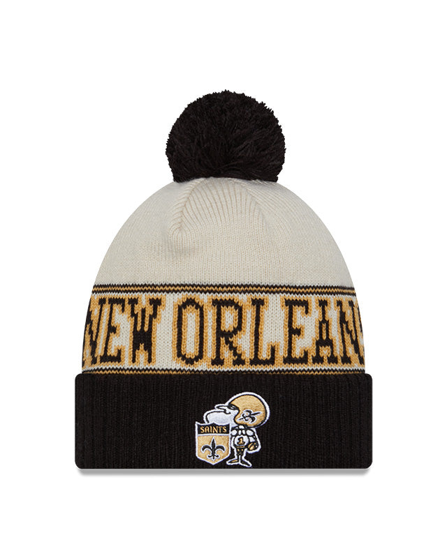 New Orleans Saints New Era 2023 Sideline Historic Pom Cuffed Knit Hat - Cream/Black