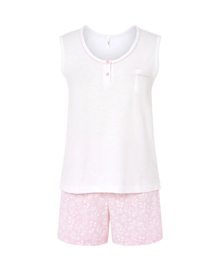 Pijama corto de mujer sin mangas punto flamé, cuello redondo con botones y vivo. Pantalón corto rosa ajustable flores blancas