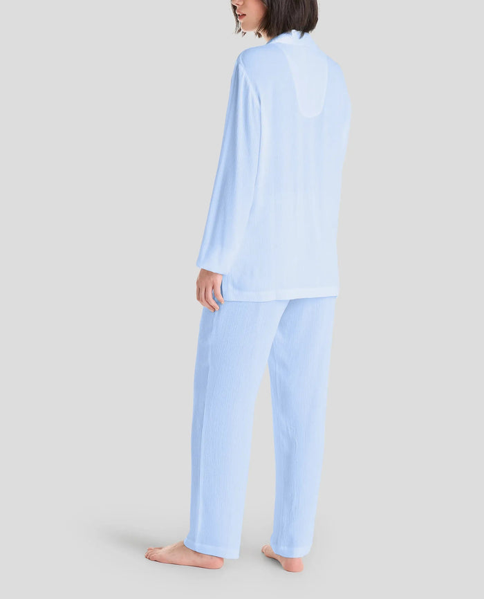 trasera de pijama largo veraniego de mujer en azul de manga larga y bolsillos