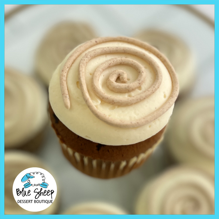 Pumpkin cupcake with cinnabutter filling and cream cheese frosting – seasonal fall dessert from Blue Sheep Bake Shop in Somerville NJ.