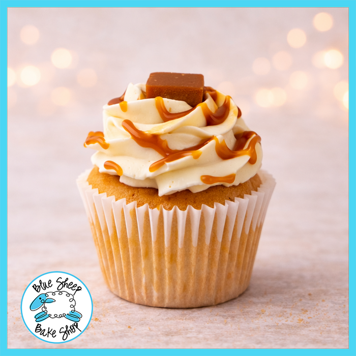 Salted caramel cupcake made with vanilla sponge, house-made salted caramel filling, caramel buttercream frosting, caramel drizzle, and caramel square topper from Blue Sheep Bake Shop in Somerville NJ