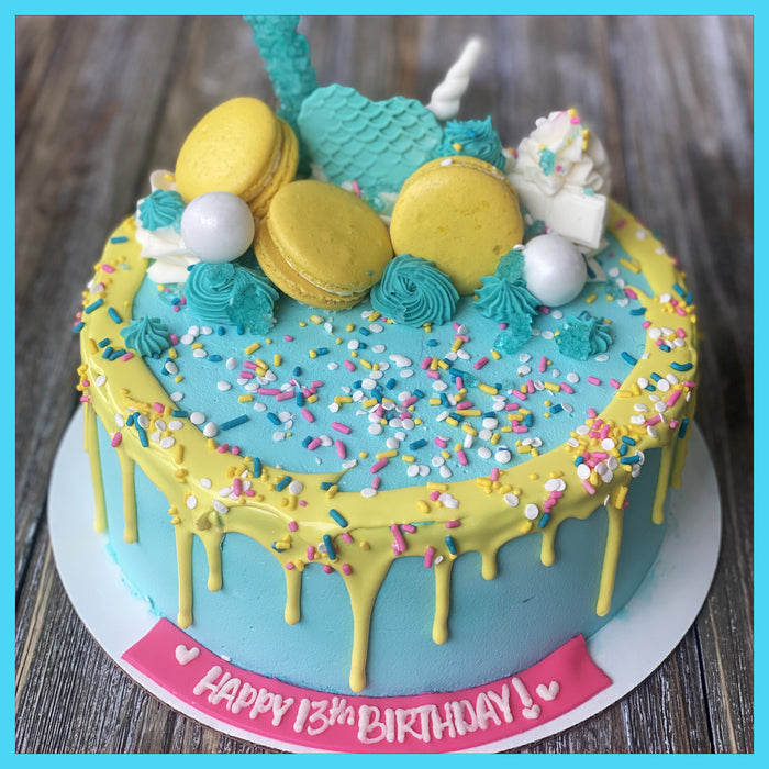Teal and Yellow Ice Cream Drip Cake