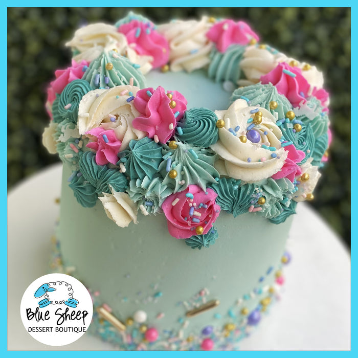 teal coronet signature cake