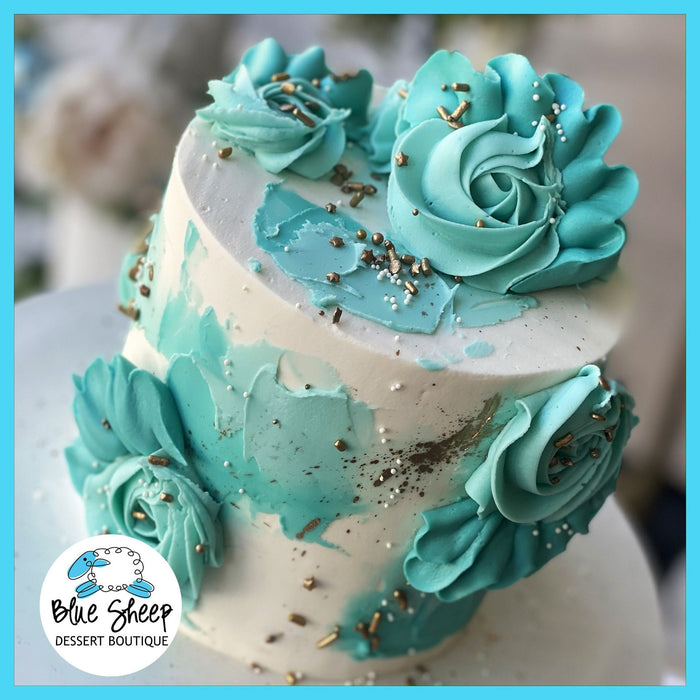 teal ribbon rosette cake