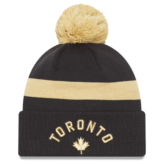 Toronto Raptors New Era Black and Gold City Edition 2022-23 Pom Knit Toque