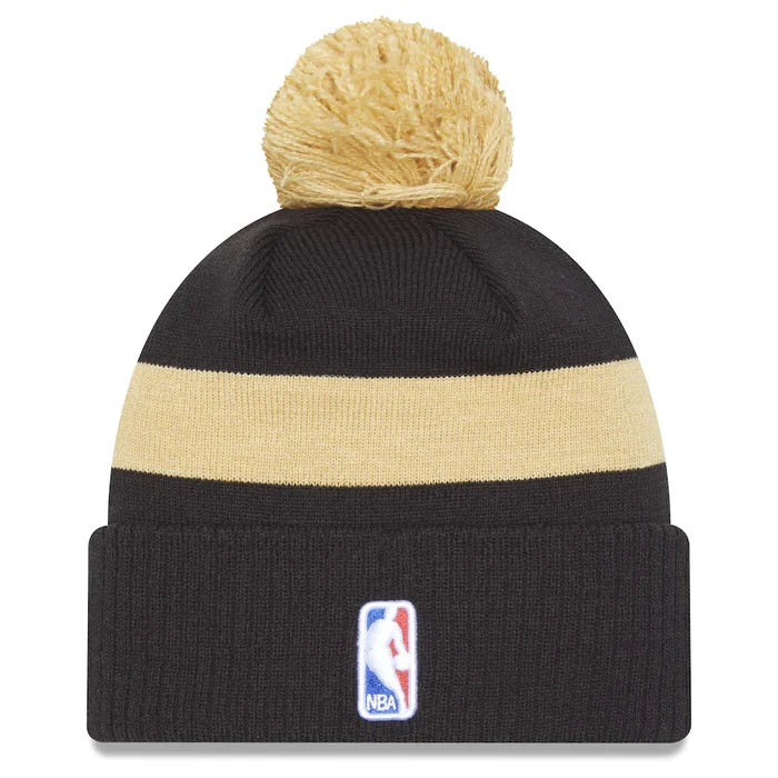 Toronto Raptors New Era Black and Gold City Edition 2022-23 Pom Knit Toque