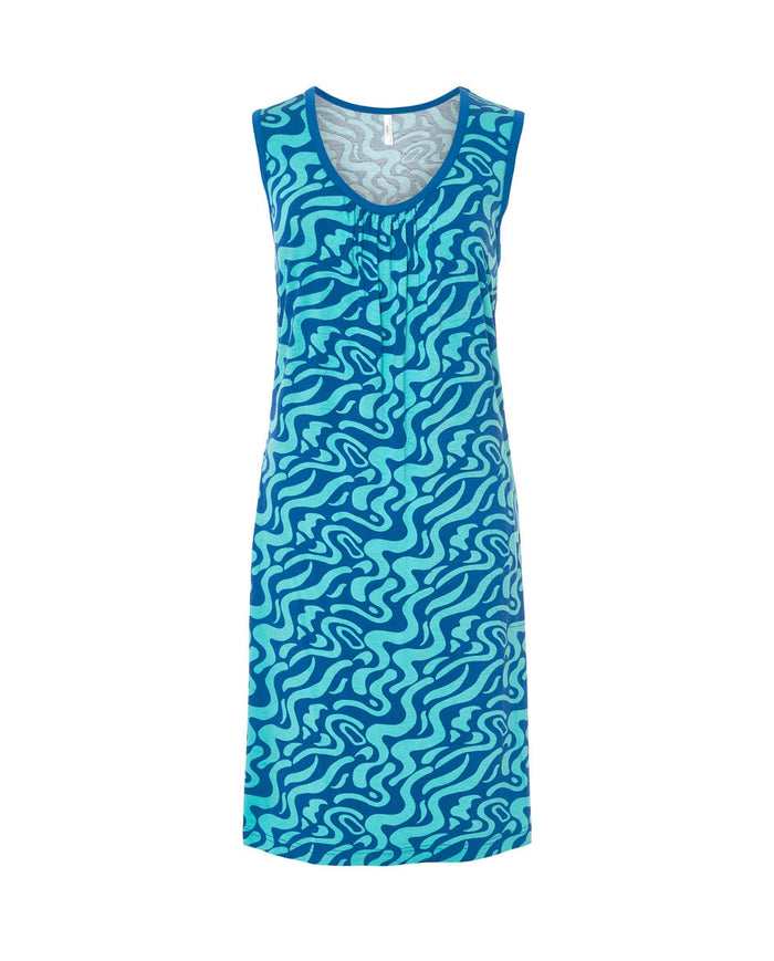 Vestido de baño corto sin mangas en punto azul con estampado ondas con cuello redondo y boslillos laterales.